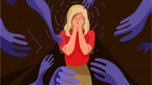 Cartoon-style illustration of a anxious woman covering her face with her hands while ghostly purples hands reach towards her