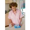 thumbnail image of older woman using a medications organiser (Webster pack)