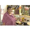 thumbnail image of older indigenous woman preparing pasta