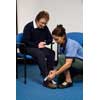 thumbnail image of older woman getting shoes fitted