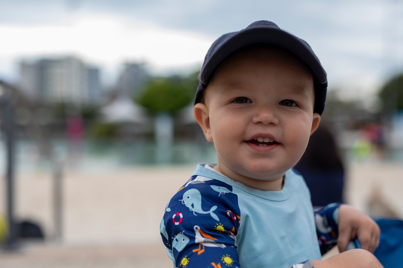 Smiling young boy being sunsmart