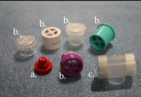 Tracheostomy attachment - speaking valves and caps