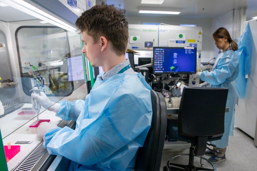 Pipetting samples onto a MALDI-TOF mass spectrometry chip for analysis .