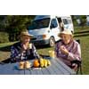 thumbnail image of older couple lunching outdoors