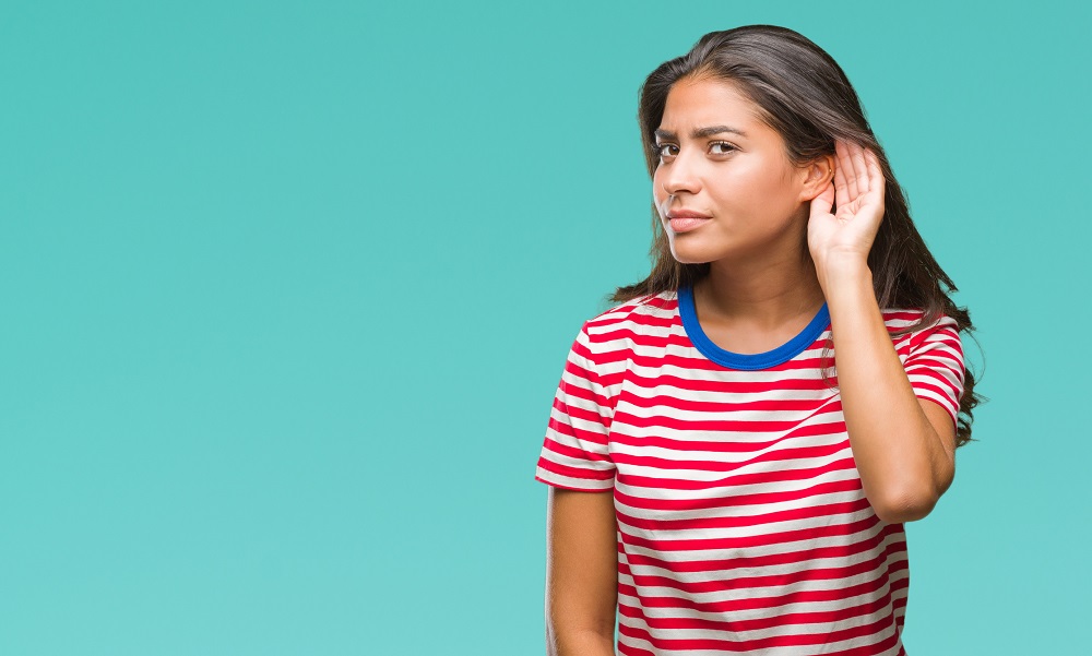 Woman experiencing hearing loss