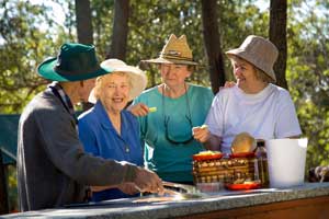 Older people talking outdoors