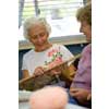thumbnail image of older women doing craft activities