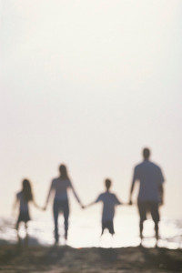 family on a beach together