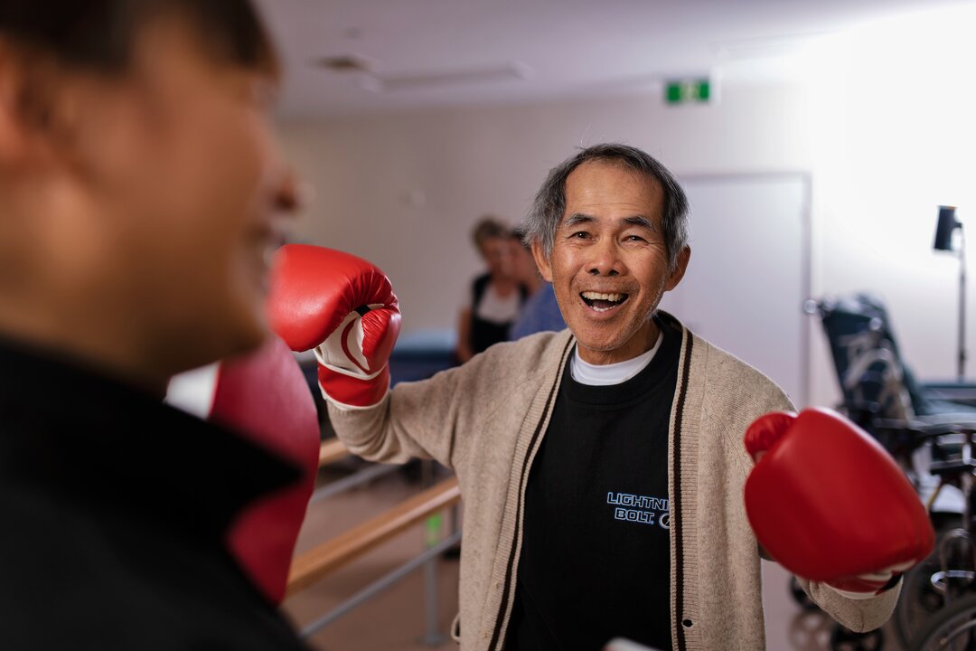 Patient spars with physiotherapist at Brighton Health Campus