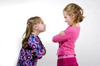 two little girls arguing