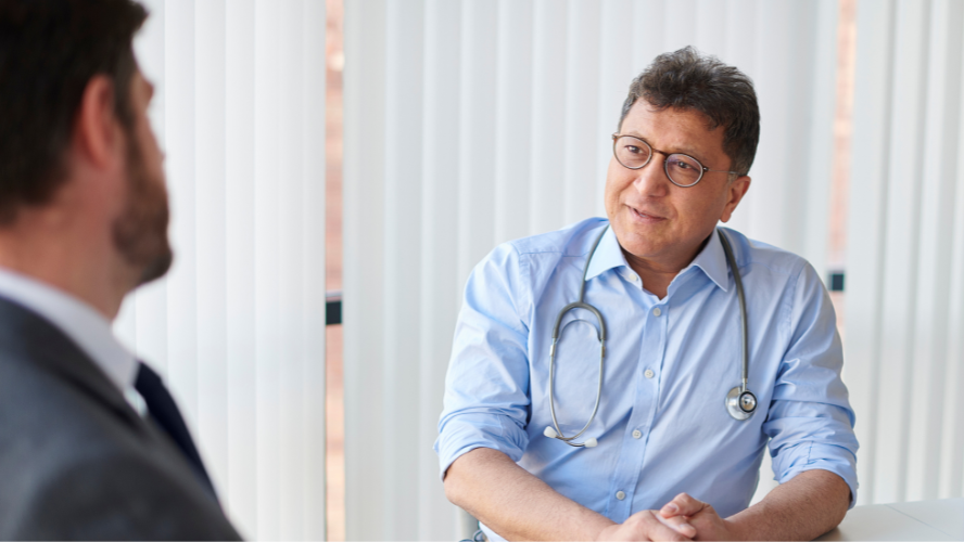 A man speaks to a GP.