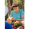 thumbnail image of older woman at a picnic