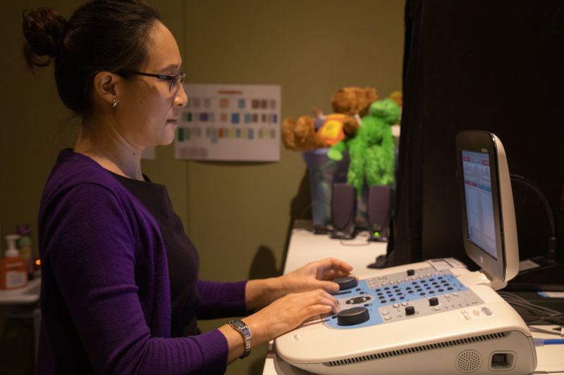 Janice uses audiology equipment that is similar to a large computer. 