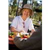 thumbnail image of older woman at a picnic