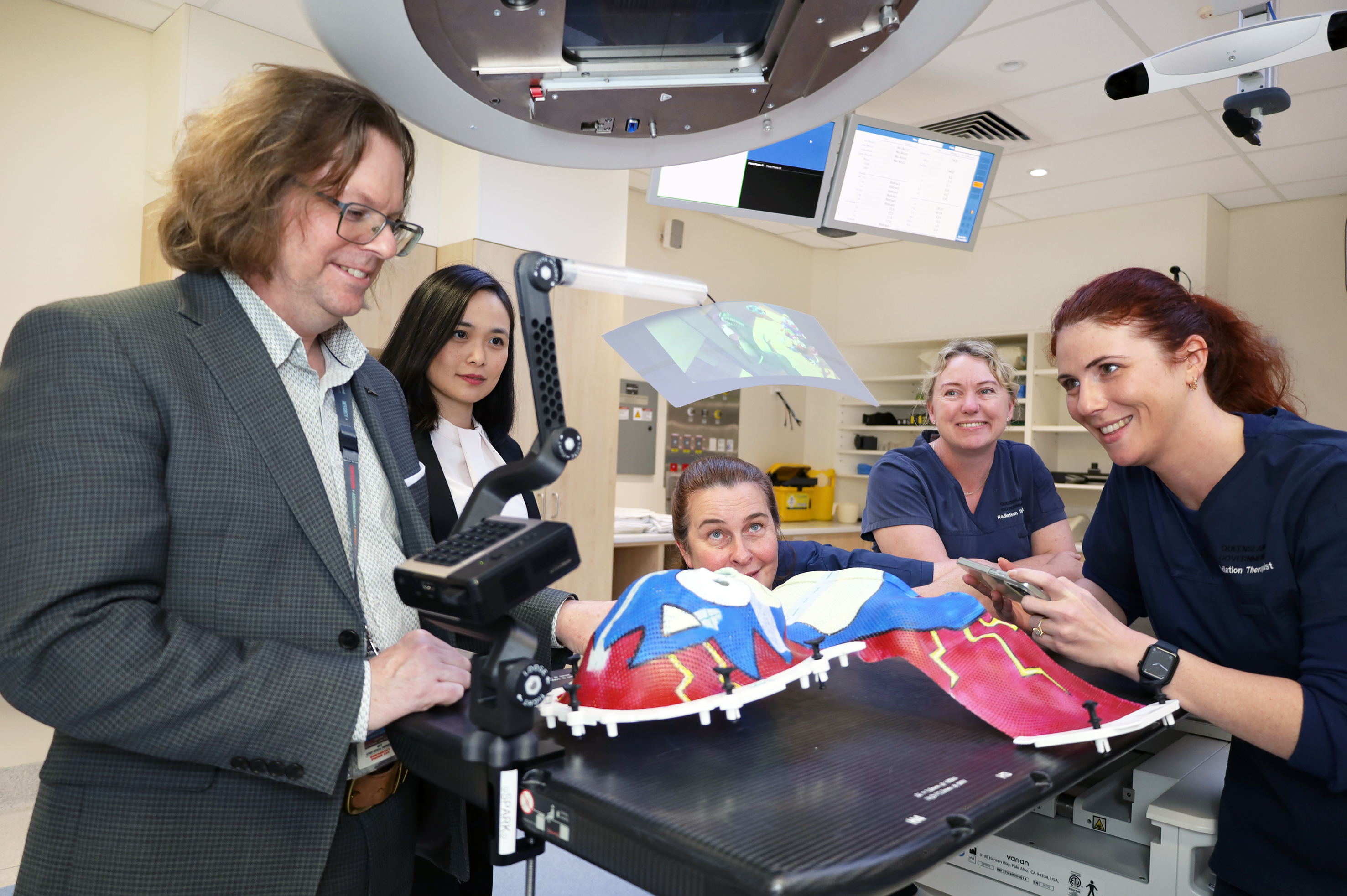 The team bringing SPARK to life: paediatric radiation oncology com, Sensultant specialist Dr Andrew Pullar, Medical Physics Research Consultant Lucy Sinior Radiation Therapist Narelle Wallace, Radiation Therapist Jodi Mitchell and Radiation Therapist Senior Aimee Welch. 